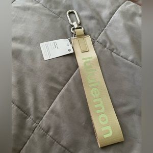 brand new “never lost” lululemmon keychain